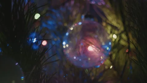 Close-up bokeh of Christmas tree decorations. Video stock 260870022