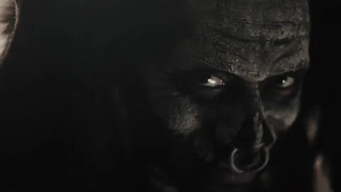 Close up of Bokor or Haitian witch doctor, approaches his victim - Reenactment 動画素材 202896001