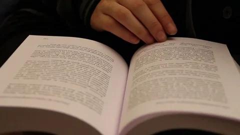 Close up on book page turning Stock Footage 79048447