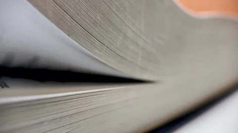 Close up of book pages turning rapidly Stock Footage 339263503