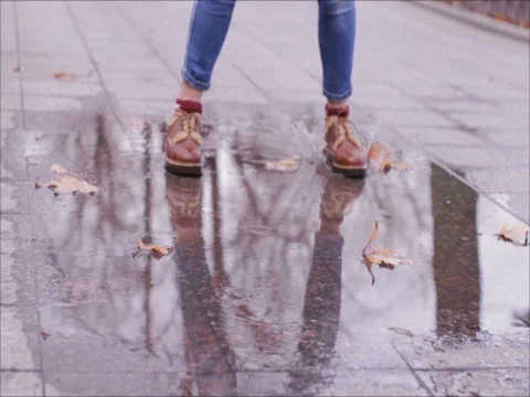 Close up boots in wet weather Stock Footage 84993448