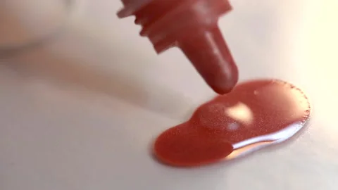 Close up of a bottle apply makeup liquid blush. Video stock 143556883