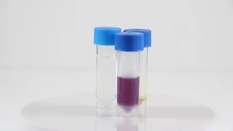 A close up of a bottle blue Vídeos de archivo 128828697