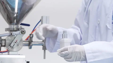 Close the bottle cap Skincare container Filling Machine in Laboratory Stock Footage 247484347