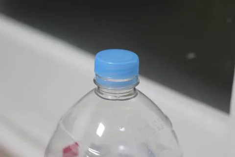 Close-Up Of Bottle Over White Plastic Bottle Foto stock