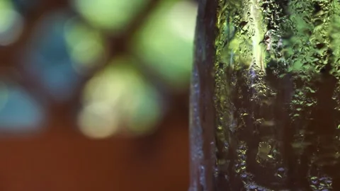 Close-up of a bottle of water is removed from the table. Condensation on table Stock Footage 247670478