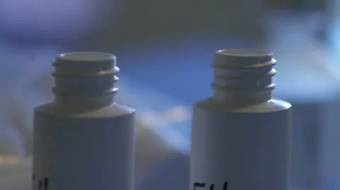 Close of bottles and lids in lab Stock Footage 20447311