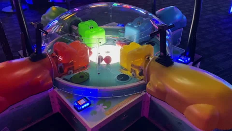 Close-up of Bottomless Potamus multiplayer hungry hippos arcade game withDave-24 Stock Footage 339491201