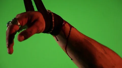Close-up of a bound arm with arm/finger movement in front of green screen Stock Footage 81571401