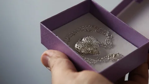 Close the box with a decorative heart Stock Footage 123536634