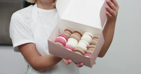 Close Up Box In Hands Of Female Confectioner. Traditional French Dessert Stock Footage 150465636