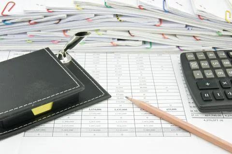 Close box of yellow note and pencil with calculator Stock Photos
