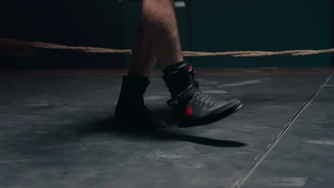 Close-Up of Boxer Jumping Rope. Intense Training on Boxing Ring Stock Footage 302730788