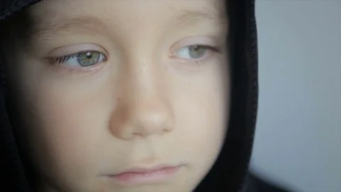 Close-up of a boy in a black hood Stock Footage 71756063