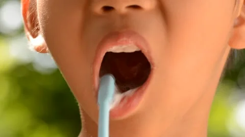 Close up boy brush tooth on green bokeh background Stock Footage 51802137