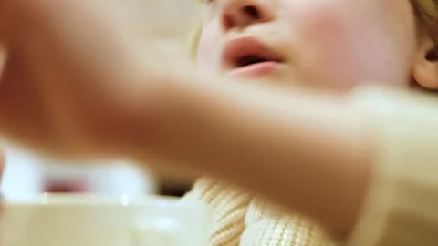 Close up of boy covering camera with hand during lunch 스톡 동영상 305141586