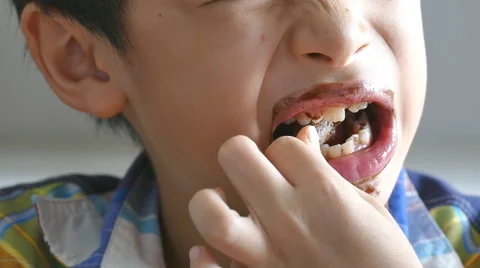 Close up of boy eating ice cream Stock Footage 56022892