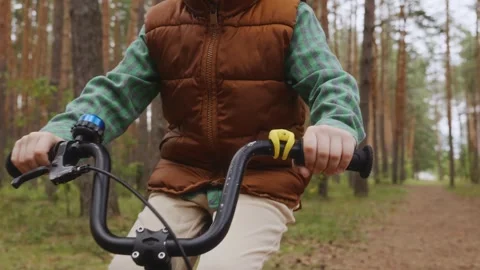 Close up boy hands holding handlebar cycling sport Stock Footage 316581504