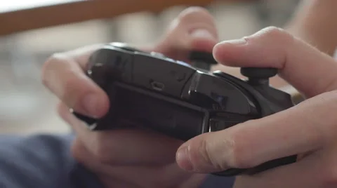 Close up of boy hands using game controller, in the end throwing the controller Video stock 68293439