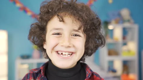 Close-up of boy smiling at camera. Happiness. Stock-Footage 227657464