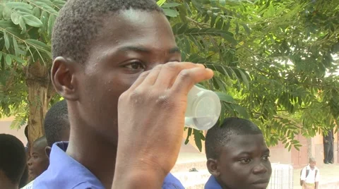 CLOSE UP: BOY STUDENT DRINKING WATER Stock Footage 59865591
