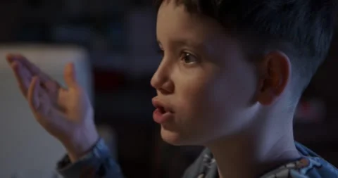 Close-up of boy talking animatedly Stock Footage 326875231