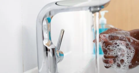 Close Up Of Boy Washing Hands With Soap At Home To Prevent Infection Stock Footage 125472676