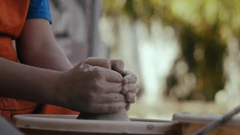 Close-up, Boy's Hands Process A Piece of Clay on the Pottery Circle Stock Footage 122110556