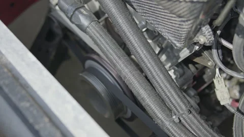 Close-up of braided fuel lines and engine components Vídeos de archivo 340610823