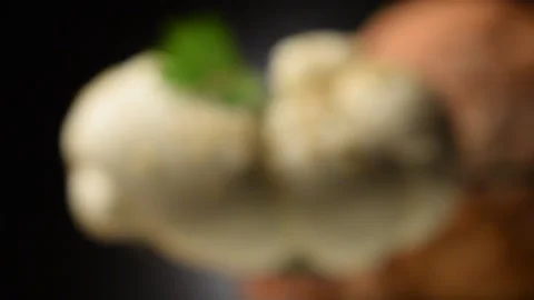 Close up on braided mozzarella and bread Stock Footage 145820696