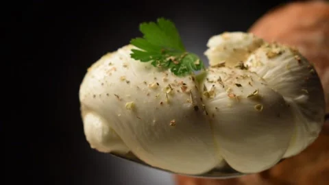 Close up on braided mozzarella and bread Stock Footage 145820698