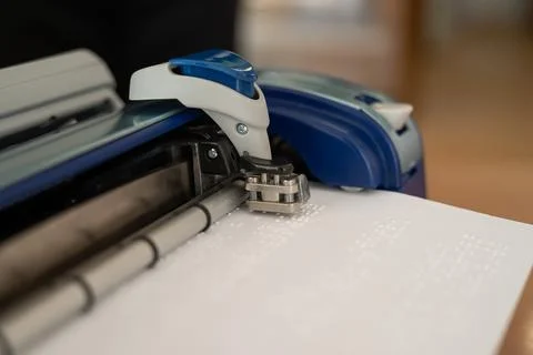 Close-up of a braille code printing machine. Stockfoto's