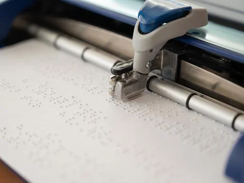 Close-up of a braille code printing machine. Foto stock