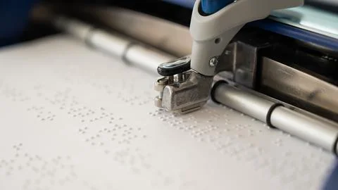 Close-up of a braille code printing machine. Foto stock