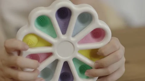 Close-up of brain game and child's hand. Stock Footage 203712874