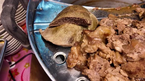 Close Up of Braised Duck Meat and Blood Pudding at Thai Street Food Stall Stock Footage 336902944