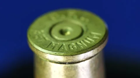 Close up of a brass bullet casing with 357 magnum markings showing details Stock Footage 328579595