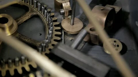 Close-Up of Brass Gears and Mechanical Clockwork Movement 스톡 동영상 345751848