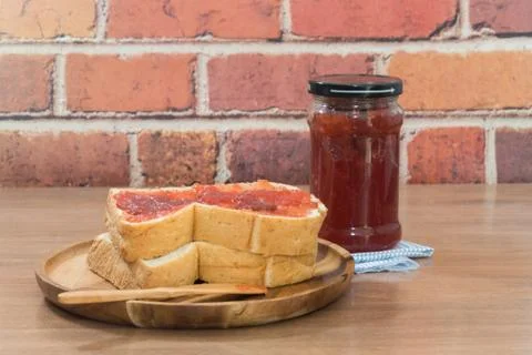 Close up of bread and strawberry jam Stock Photos