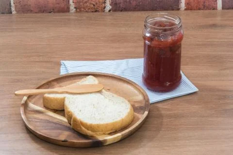 Close up of bread and strawberry jam Stock Photos