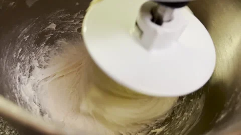 Close up for bread making process by using flour mixing machine Video stock 275582897