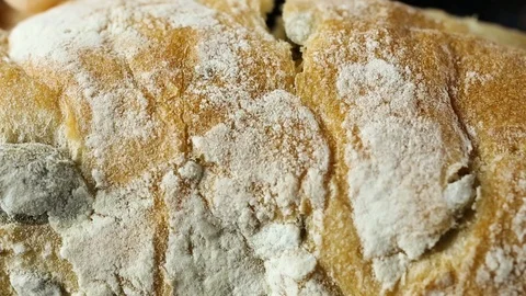 Close-up bread in male hands macro texture Stock Footage 104972934