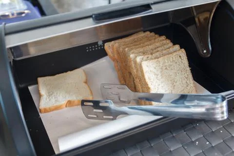 Close up of bread in the Modern steel bread bin Foto stock