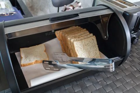 Close up of bread in the Modern steel bread bin Stock Photos