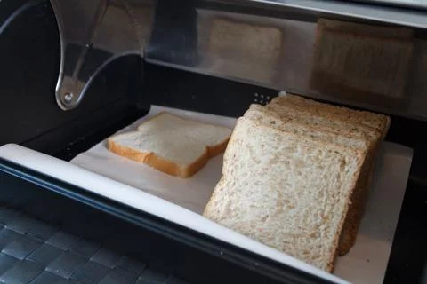 Close up of bread in the Modern steel bread bin Stock Photos