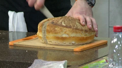 Close-up of the bread slicing Stock Footage 308881091