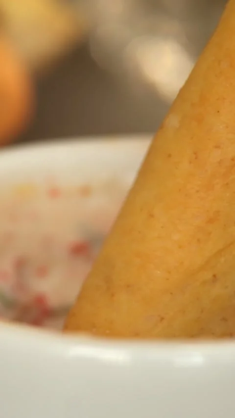 Close up of bread stick is dipped in mayonnaise sauce with spices. Food. Bread Stock Footage 326300427