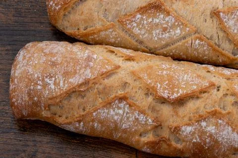 Close-up bread sticks on a cutting board Stock Photos