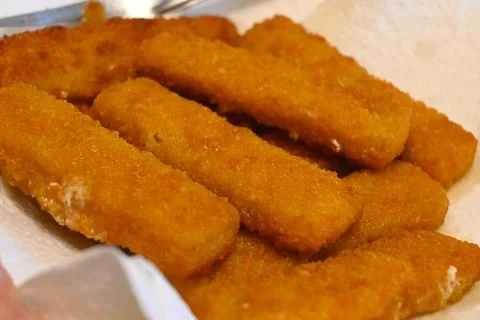 Close-up of breaded fish sticks Stockfoto's
