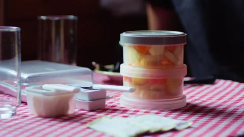 Close-up Breakfast Table with Fruit Salad Containers. Stock Footage 277359253